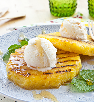 Grilled Pineapple with Mango Sorbet and Toasted Coconut