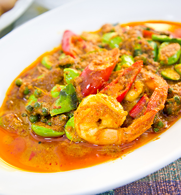 shrimp and vegetables with red curry sauce