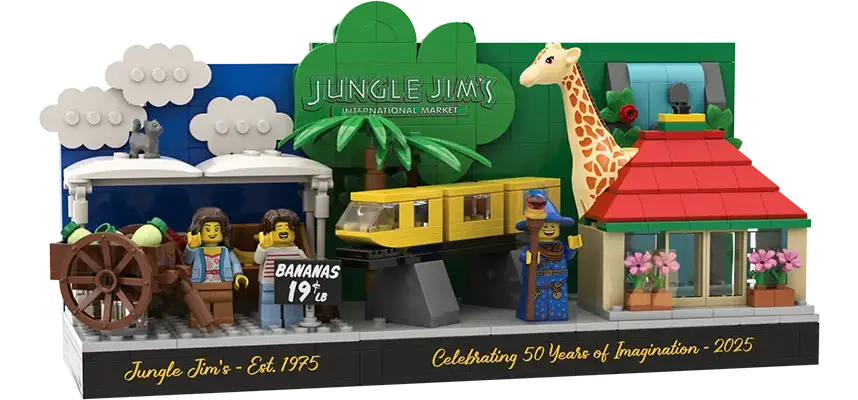 a lego set showing a fruit stand, grocery store, and a monorail