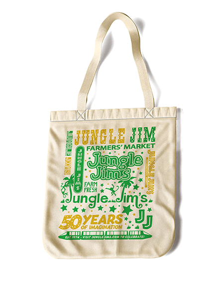 A tote bag with several vintage Jungle Jim's logos printed on it